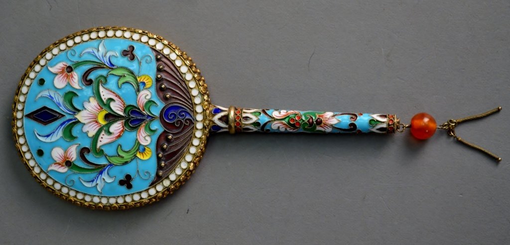 Silver and Enamel Mirror: A stunning enamel and silver mirror featuring beautiful intracate designs and vibrant colors. 6 1/2" X 2 1/2".