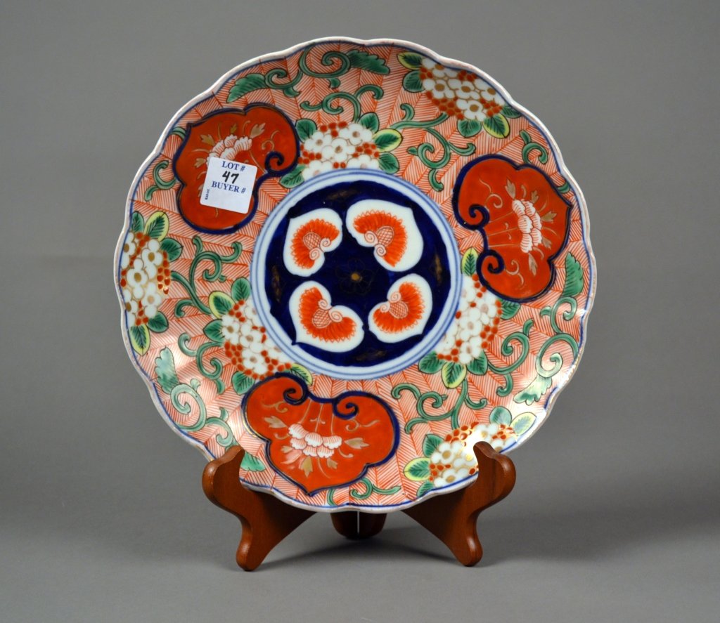Antique Imari Plate: Highly decorated Imari plate in greens, blues, and iron red. 9 1/2" dia.