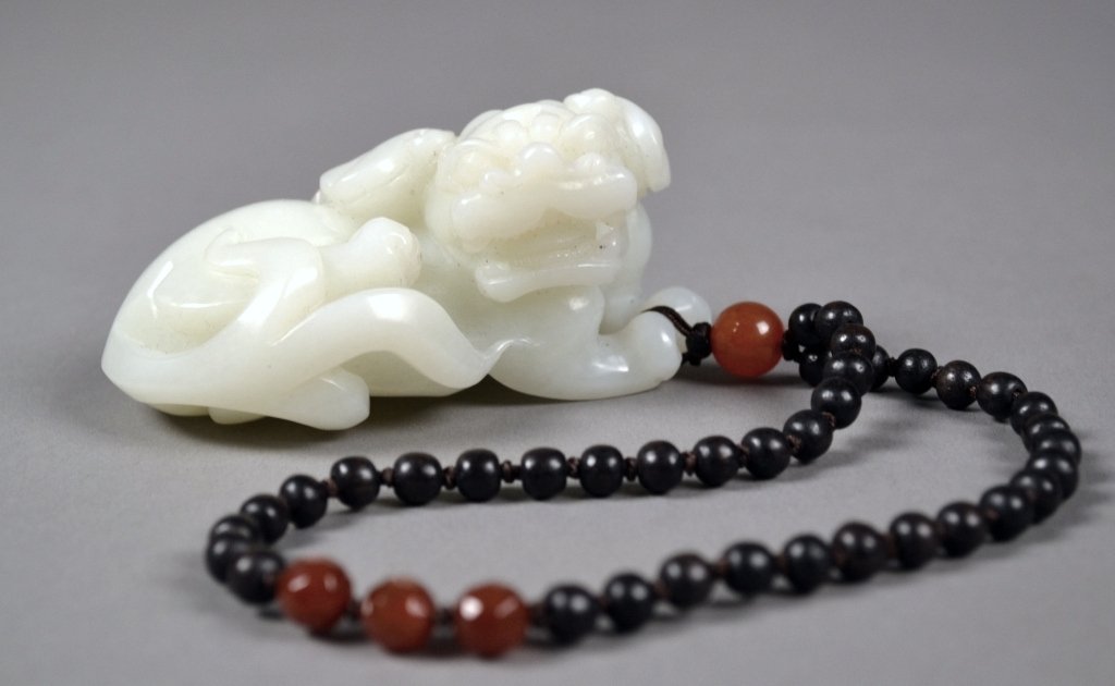 Chinese Hetian White Jade Dog: Jade dog measures 3 1/2" x 1 3/4" x 2 1/4", weight 222 g. A stunning piece.