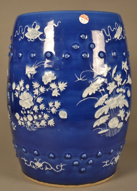 Antique Chinese Garden Seat: Breathtaking antique Chinese garden seat with a nice blue ground and white floral decorations. 12 1/2" dia. x 19 1/2" tall.