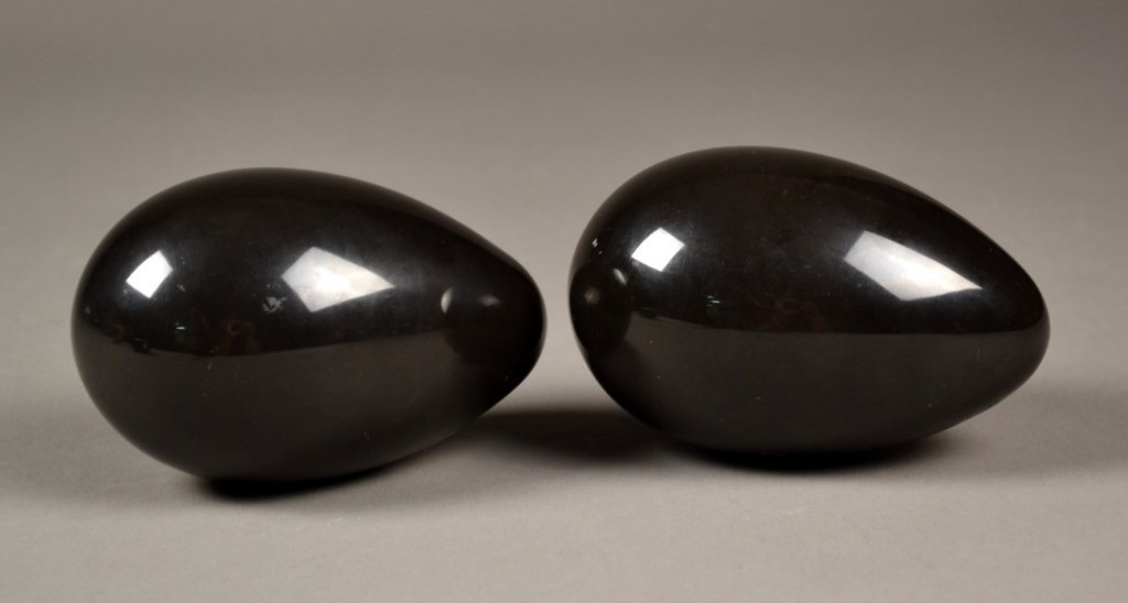 Pair of Black Stone Eggs, Signed "Cartier": Pair of black stone eggs, each signed "Cartier".