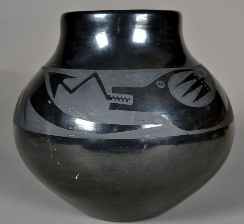 Marie + Santana San Ildefonso Blackware Pottery Va: Beautifully detailed San Ildefonso blackware pottery jar by Marie & Santana Martinez. Signed to base "Marie + Santana". Mid 20th century. 6 1/2" high x 7 1/2" dia. at widest point.