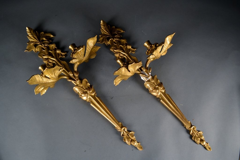 Pair of Decorative Brass Wall Sconces: Pair of decorative brass wall sconces. Each measures 24"H x 10 1/2"W.