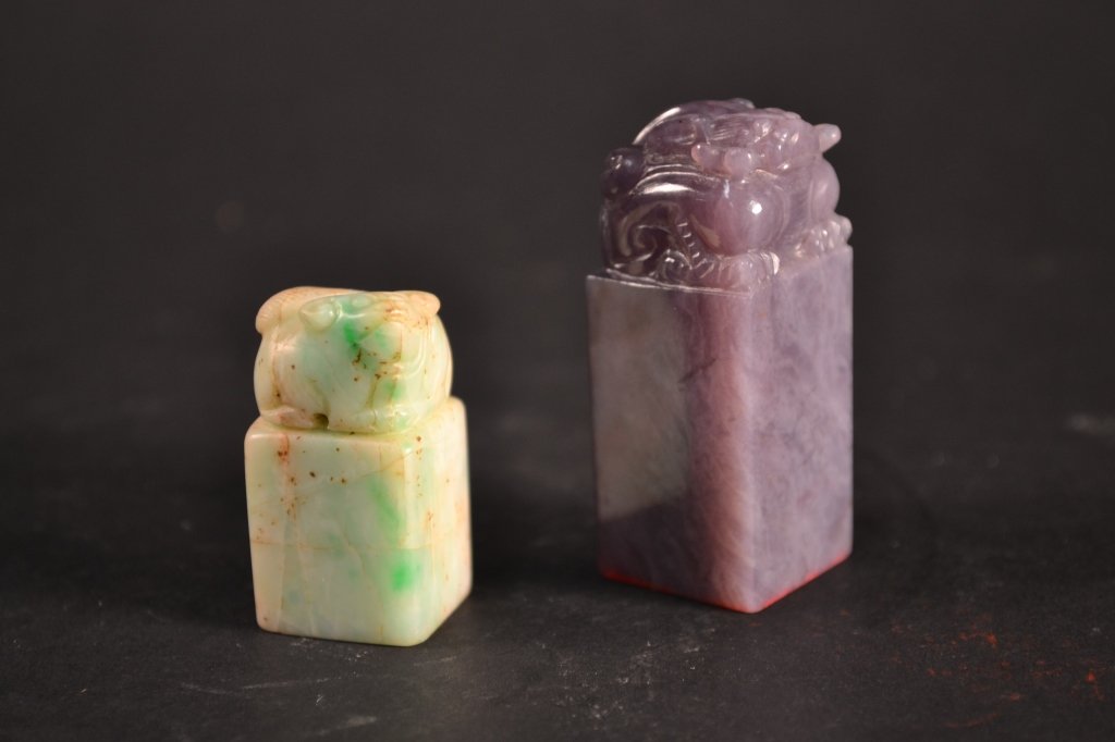 two seals / chops one soapstone and one agate or simil: two seals / chops one soapstone and one agate or similar hardstone. both approximately 2" tall