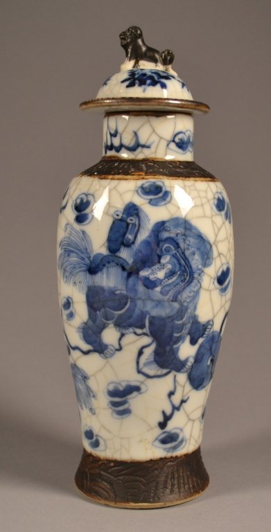Chinese Blue & White Crackle Ware Vase Nice vase with: Nice vase with underglazed blue design, square mark to the base, with Fu Dog Lid. 11" T