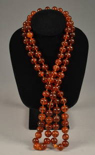 Huge Strand of Old Amber Beads 58" L - 139 grams.: 58" L - 139 grams.