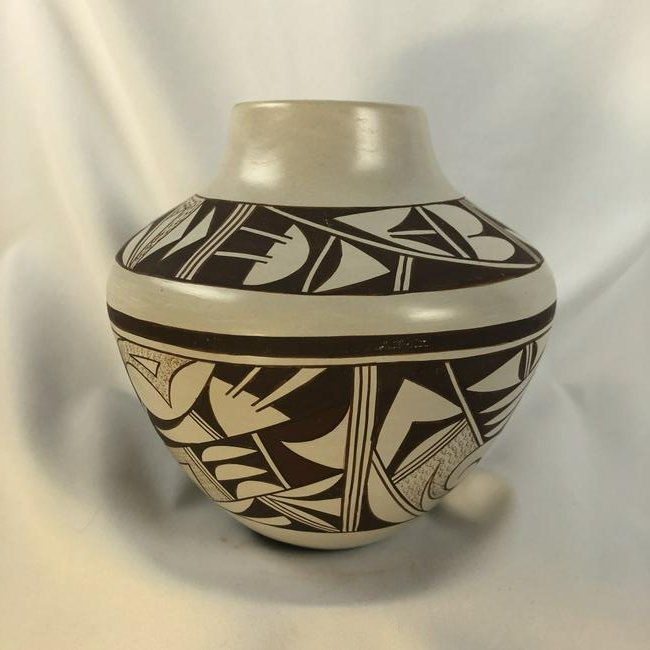 Joy Navasie (Frog woman) Hopi-Tewa Pottery: Modern ethnographic jar made by the late Joy Navasie (Frog Woman), a Hopi-Tewa potter. She was also known as Yellow Flower, from the Kachina Clan, Hopi/Tewa Pueblo in northeastern Arizona. Using tradi