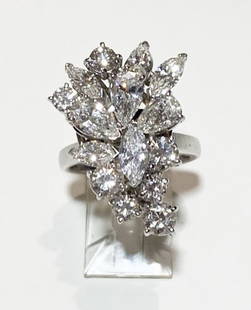 15 Diamond Custom Platinum Women: Women's Platinum Handmade Ring which makes into a pendant consisting of 4 pear shaped diamonds weighing approximately 3 carats, 4 marquise shaped diamonds weighing approximately 1 carat and 20