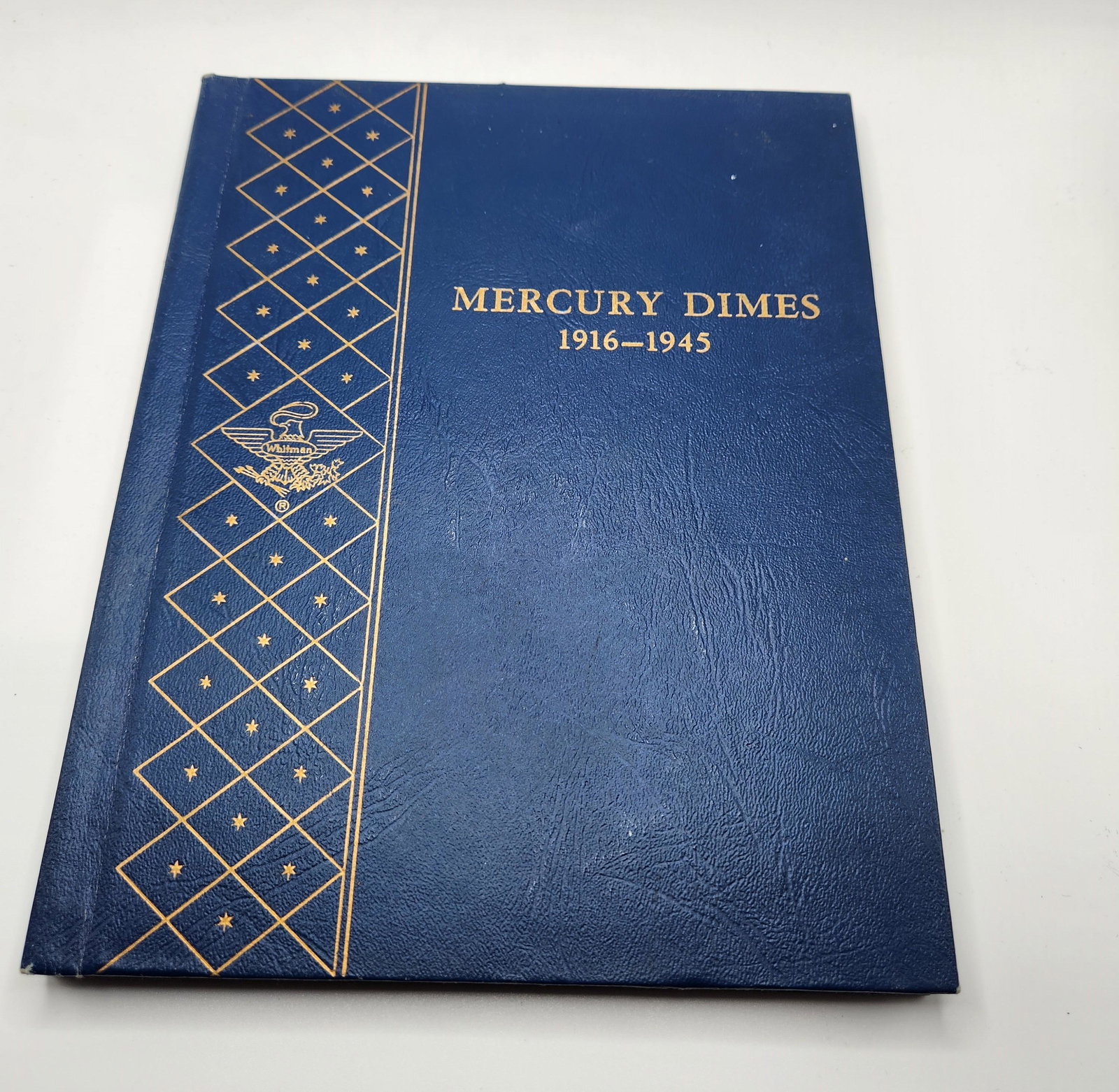Mercury Dimes 1916-1945 Collection in Witman Publishing folder with 42 Mercury Dimes (1 of 10)