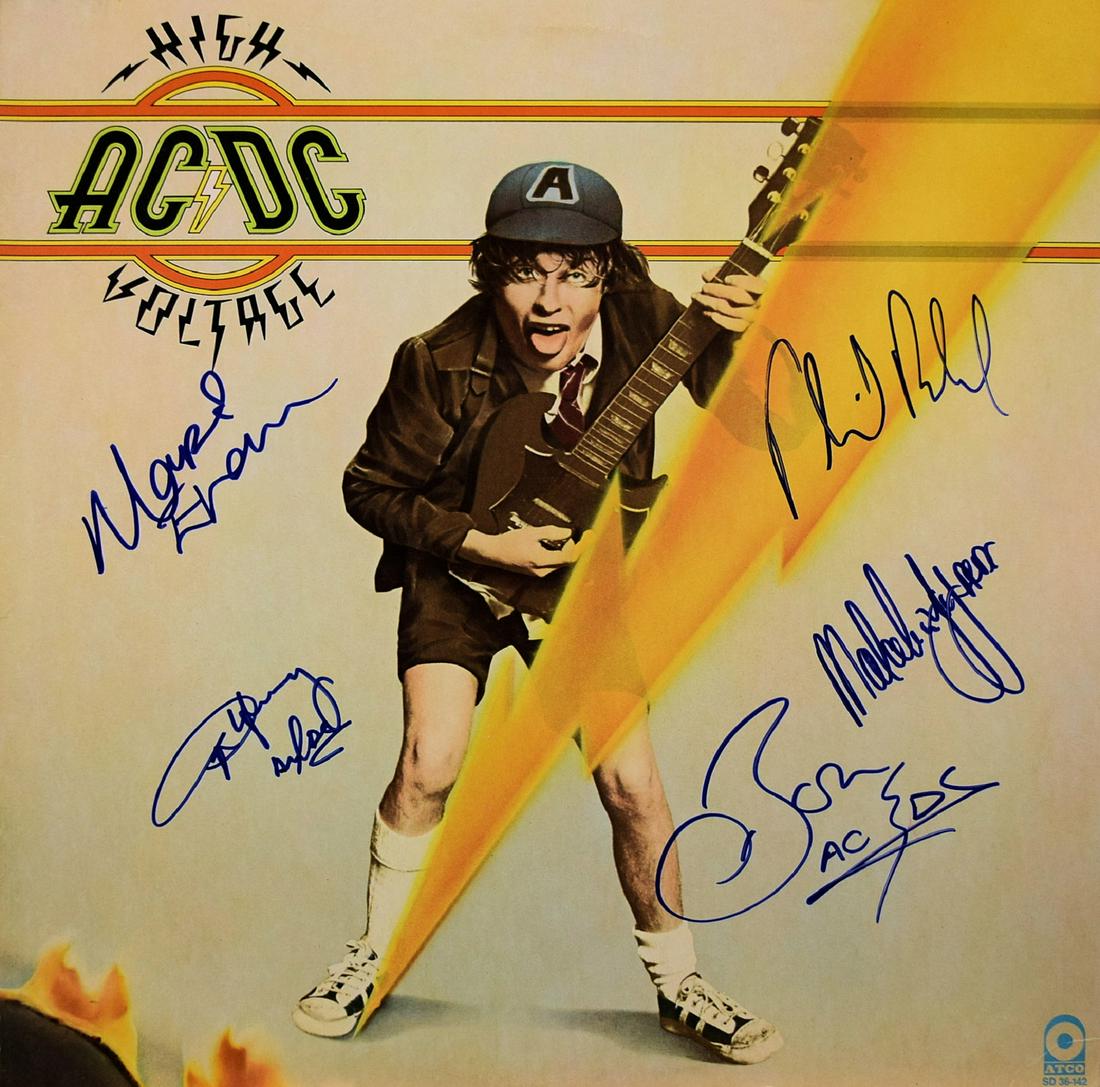 AC/DC signed High Voltage album: AC/DC 1976 High Voltage album. Signed: Bon Scott, Phil Rudd, Mark Evans, Angus Young AC/DC, and Malcolm Young AC/DC.