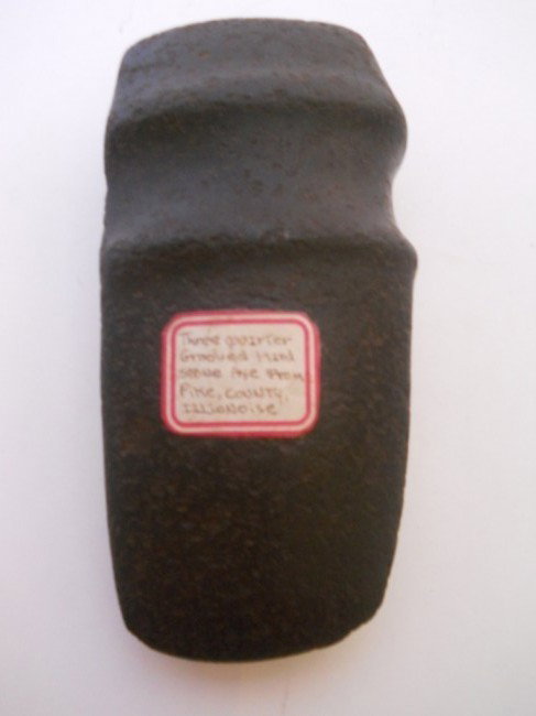 HARD STONE AXE: 3/4 GROOVED 3/4 HARD STONE AXE FROM PIKE COUNTY APPROX. 6.5"LONG X 2.5"WIDE X 1.5"DEPTH