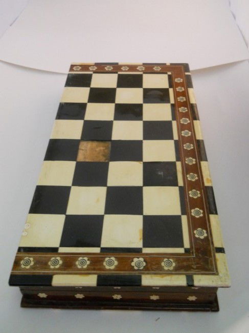 ANTIQUE CHESS BOARD WITH IVORY PIECES: ANTIQUE CHESS BOARD WITH IVORY PIECES ALL MEN ARE INCLUDED.. APPROX 18" X 18" (9"WHEN FOLDED), 2.5 DEEP WHEN CLOSED