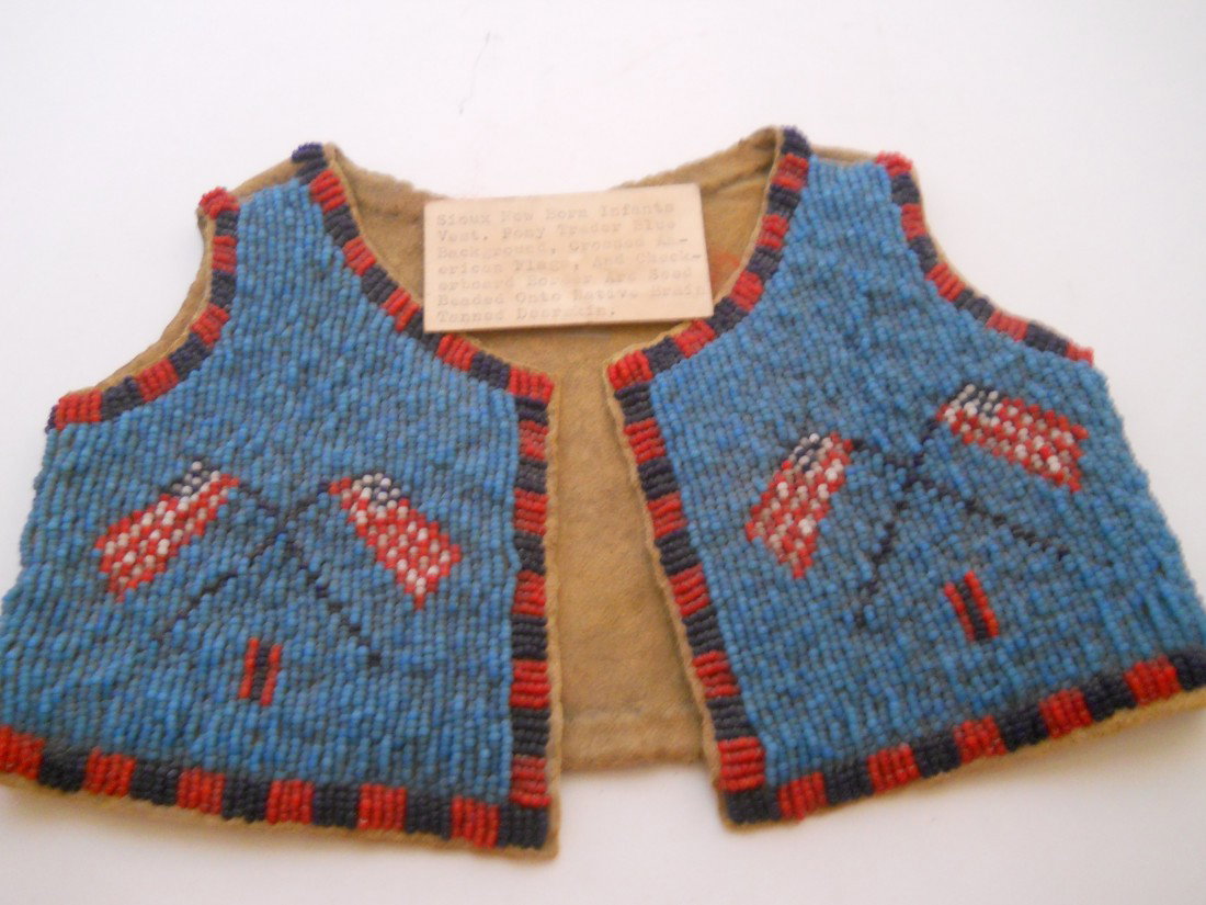 SEED BEADED INFANT VEST: SEED BEADED INFANT VEST APPROX. 8.5"WIDE X 6"HIGH LAID FLAT