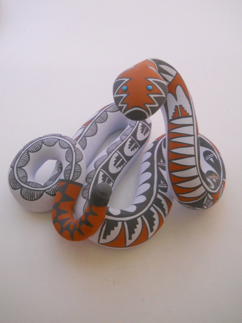 PAINTED CERAMIC SNAKE SIGNED MARY SMALL: PAINTED CERAMIC SNAKE SIGNED BY NATIVE AMERICAN POTTER AND SCULPTOR, MARY SMALL FROM JEMEZ PUEBLO, NEW MEXICO. USING TRADITIONAL METHODS OF HER ANCESTORS TO MAKE NATURAL CLAY, FIRING METHODS, AND GLAZ