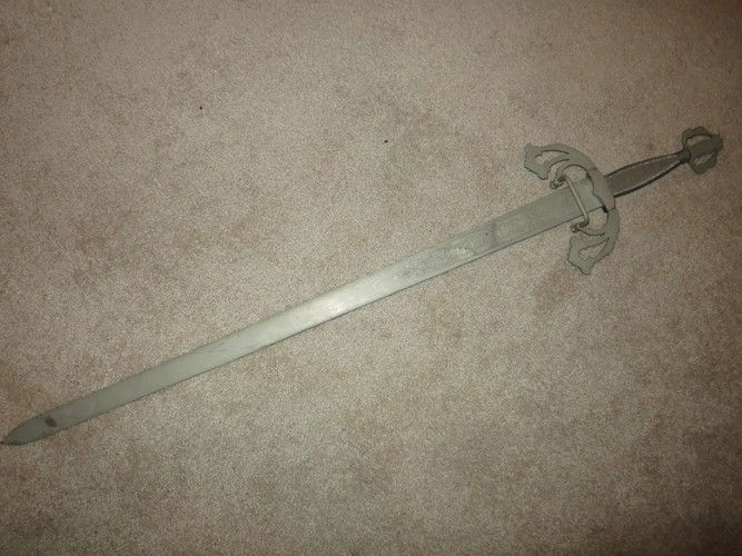 REPLICA SWORD OF TIZONA DEL CID, TOLEDO: TELEO, SPAIN KNOWN FOR HISTORICAL REPLICAS OF SWORDS FORGED LA TIZONA DEL CID. A SWORD KNOWN TO BE CARRIED BY EL CID WITH THE HELP OF ST. PETER AND LA TIZONA, THE SWORD, TO DEFEAT THE MOORS. OVER THE