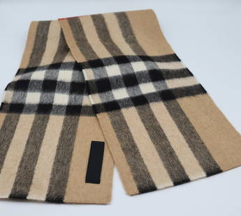 Burberry Check Cashmere Wool Silk BouclÃ© Scarf - Small: A Scottish-woven scarf in cashmere, wool and silk bouclÃ©, highlighted with an Exaggerated Check. The scarfs approx size is 3 Feet long x 6 inches wide. Ships from Newport Beach. V.