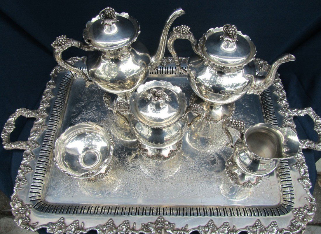 INTERNATIONAL SILVER CO. FRENCH TEA SET WITH TRAY: NTERNATIONAL SILVER CO. FRENCH TEA SET WITH TRAY. SET INCLUDES A 28'' X 23'' TRAY, 2 TEAPOTS WITH HANDLES, EACH 8'' X 7'' X 4'', A 4.5'' TALL X 3.5'' WIDE BOWL, AND A 5'' X 3'' X 6.5'' TALL PITCHER.