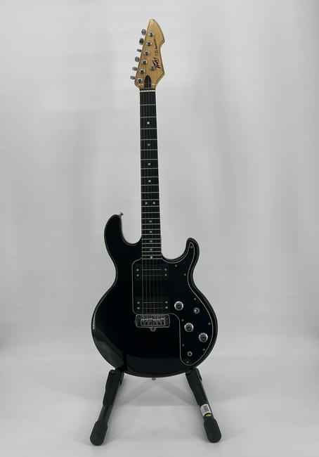 Peavy T25 Special - With Case: Peavy T25 Special - With Case. T-25 Special (made in USA 1982-1983). Black in color. The Peavey T-25 Special uses a black Ebonite material for the fingerboard vs. the regular maple fingerboard used on