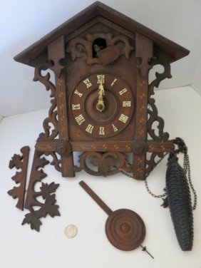 ANTIQUE BLACK FOREST CUCKOO CLOCK,NEEDS WORK: ANTIQUE BLACK FOREST CUCKOO CLOCK ROMAN NUMERALS HAND CARVED WOOD 12 INCH HIGH X 12 INCH WIDE