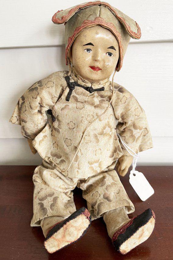 "Five Finger Ching" Chinese Mission Benefit Doll early 1900s: Description:"Five Finger Ching" China, early 20th century, laminated papier mache head (chip on forehead),painted features, black eyes, red open-closed smiling mouth with painted teeth, cloth body wit