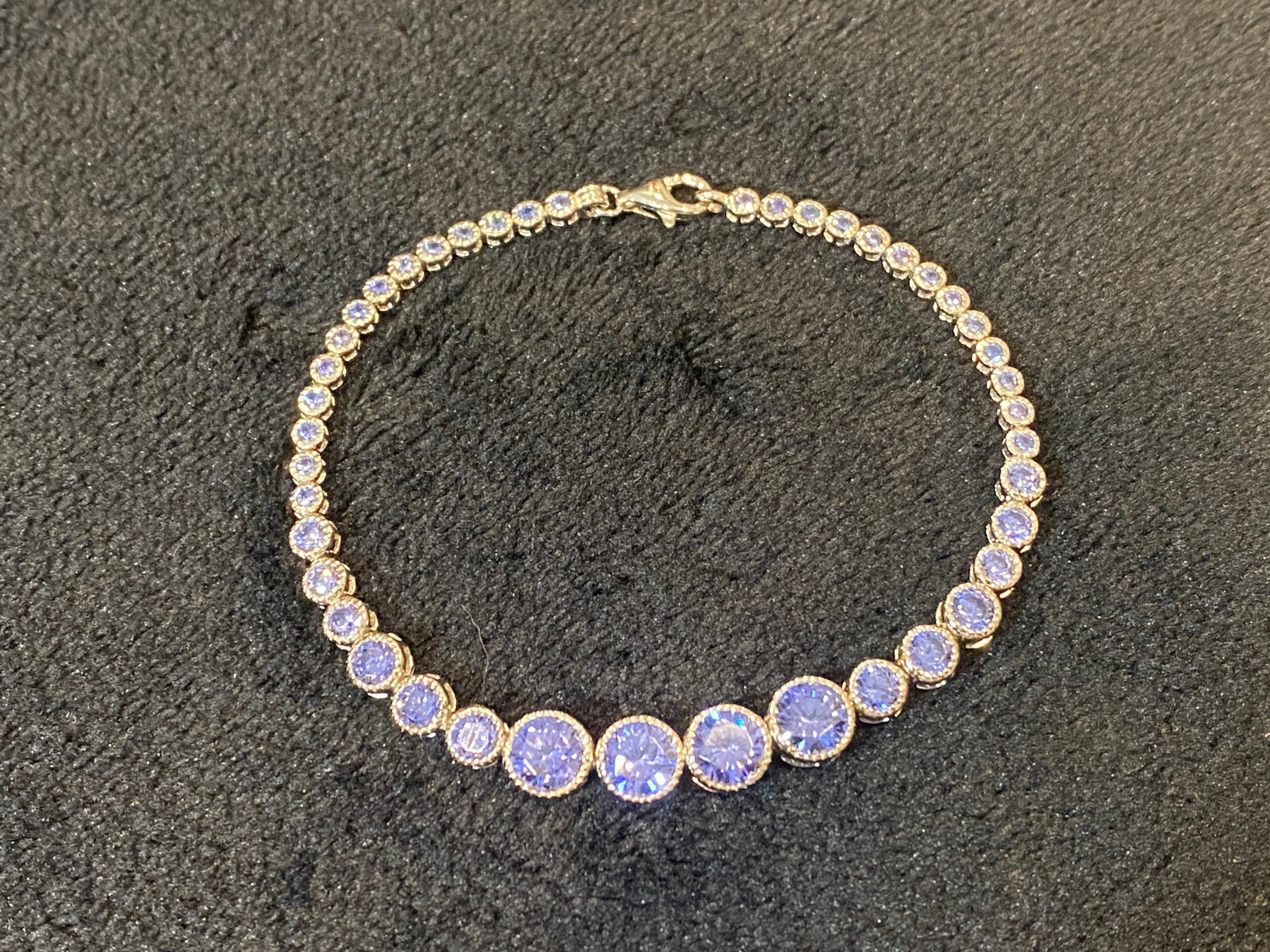 925 Sterling Silver Opaque Tanzanite Tennis Bracelet: 925 Sterling Silver Opaque Tanzanite Tennis Bracelet. Size 7.5in long. . Ships from Austin, TX.
