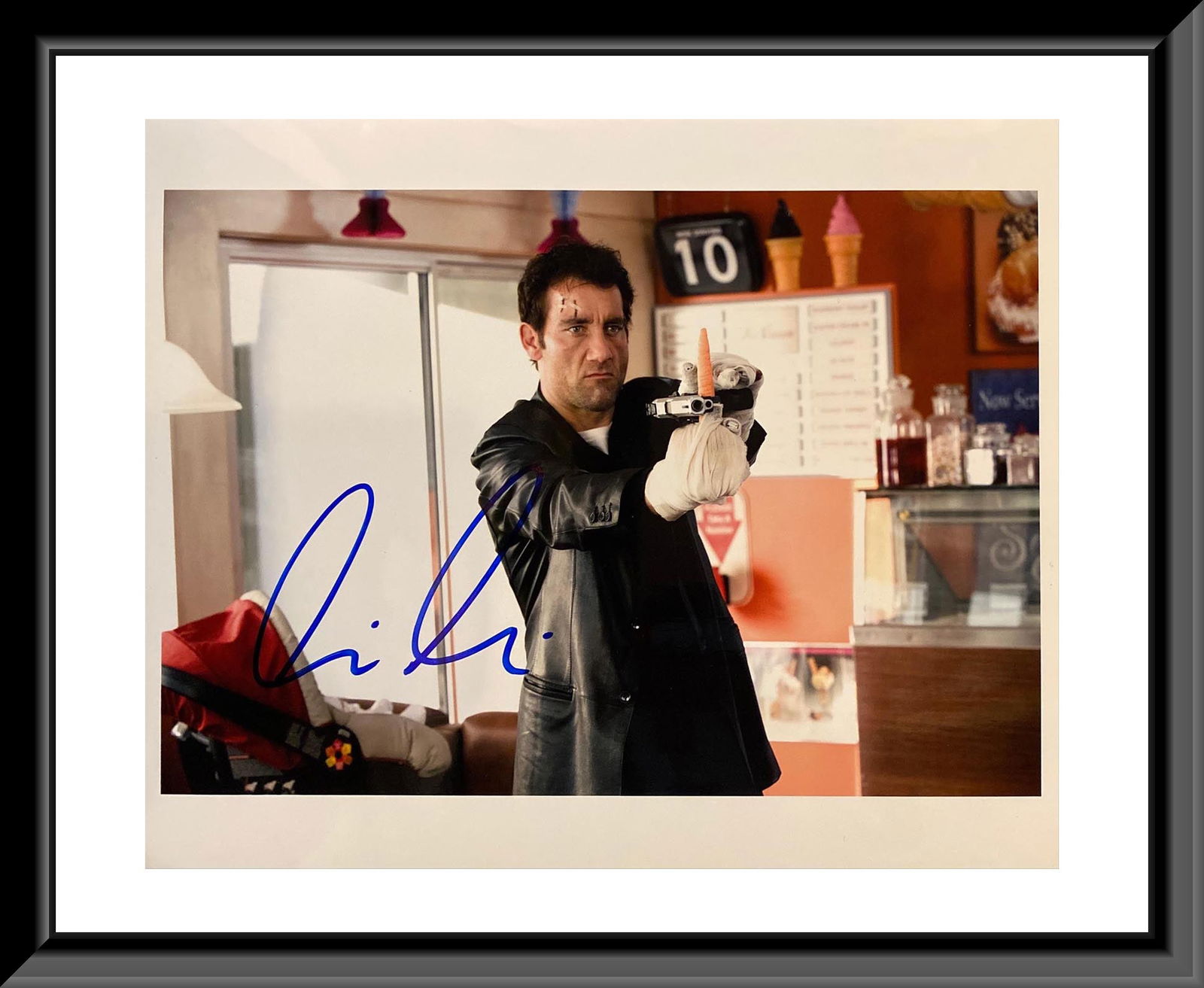 Shoot 'Em Up Clive Owen Signed Movie Photo: Shoot 'Em Up Signed Movie Photo Autographed by Clive Owen. 8X10 Inches. Shoot 'Em Up is a 2007 American action film written and directed by Michael Davis. It stars Clive Owen, Paul Giamatti, Monica Be
