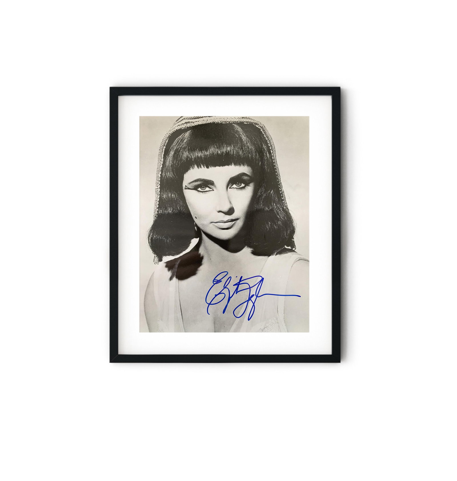 Elizabeth Taylor signed Photo: Elizabeth Taylor signed Photo. 8x10 inches. Dame Elizabeth Rosemond Taylor was a British-American actress. She began her career as a child actress in the early 1940s and was one of the most popular st