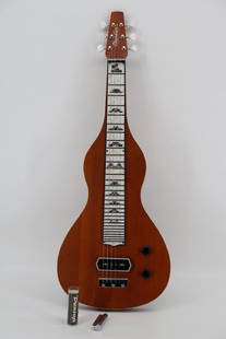 Chandler RH-2 Lap Steel.: The Chandler RH-2 Lap Steel is a premium instrument designed specifically for lap steel guitar players. It combines traditional craftsmanship with modern features to deliver a versatile and