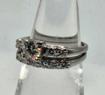 Platinum Diamond Wedding Ring 2 pc set Approx size 4.75: 10% IRID stamped Diamond Wedding ring Set. Approx Size 4.75, Approx Weight 7.3g Ships from Las Vegas, NV FW