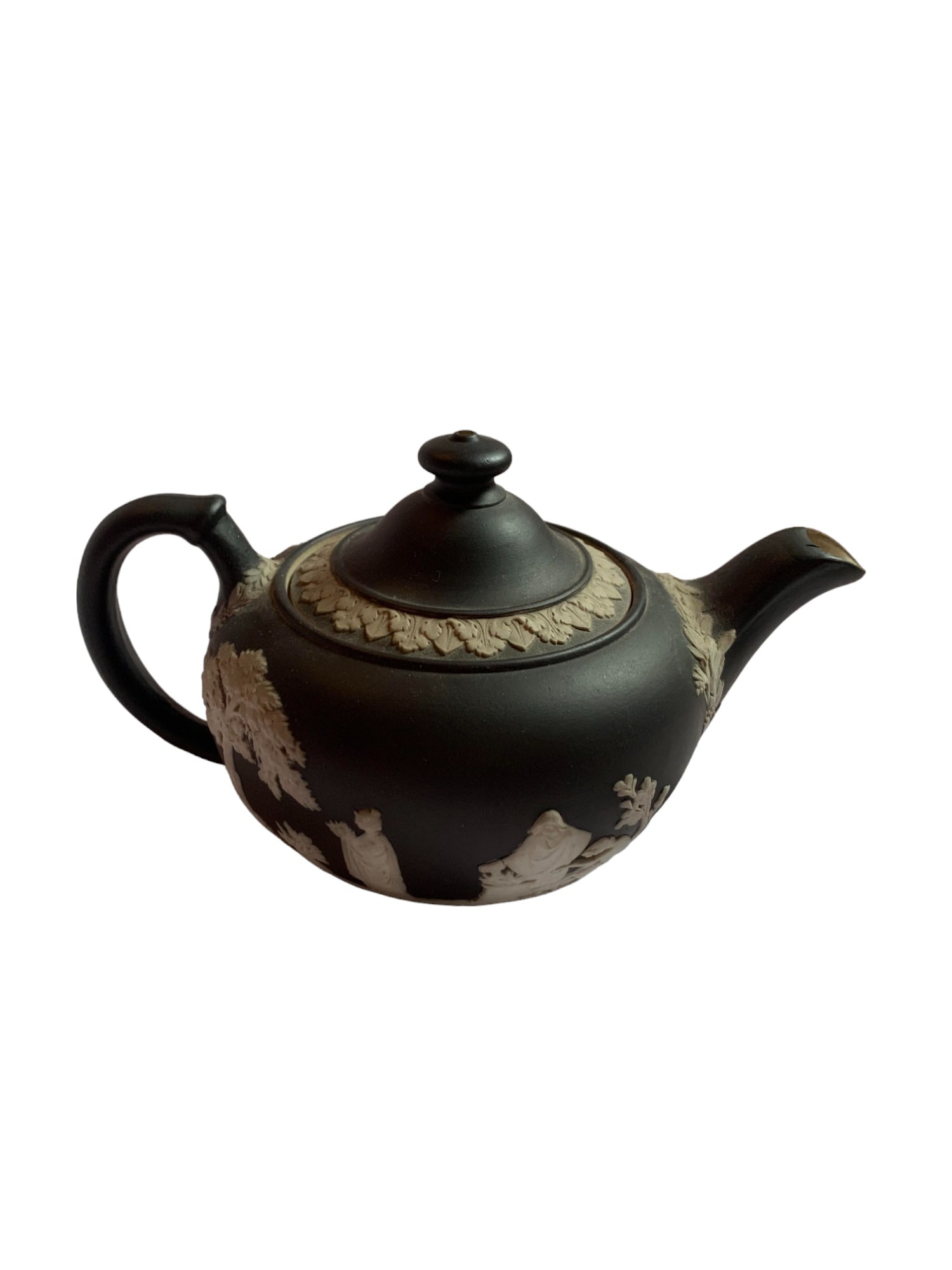 Wedgwood Black Basalt Jasperware Teapot: Wedgwood Black Basalt Jasperware Teapot. Size: 4 in height, 5 in length. SHIPS FROM NEW ENGLAND.