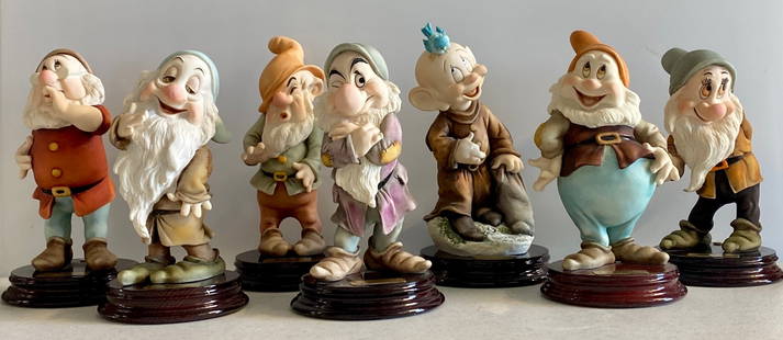 Giuseppe Armani Grump Walt Disney Seven Dwarfs Figurine Set #0917: Giuseppe Armani Grump Walt Disney Seven Dwarfs Figurine Set #0917. Dim:Averge 7 inches each. Includes all 7 Dwarfs from Snow White. Seven Dwarfs Set. Comes in the original Armani packaging. Giuseppe A