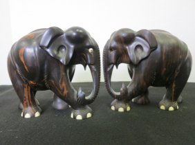 HAND CARVED WOOD ELEPHANT FROM MACASSAR WOOD 2 P: An extremely beautifully carved elephant made from macassar wood. It has a dark chocolate colour with some lighter streaking throughout. APPROX. 7'' X 6''