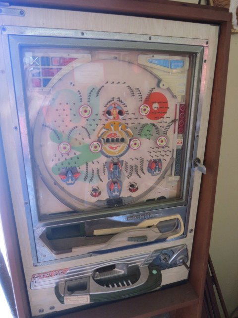 VINTAGE PACHINKO MACHINE "NISHIJIN SUPER DX: VINTAGE PACHINKO MACHINE "NISHIJIN SUPER DX APPROX 3 FEET HIGH X 2 FEET WIDE.