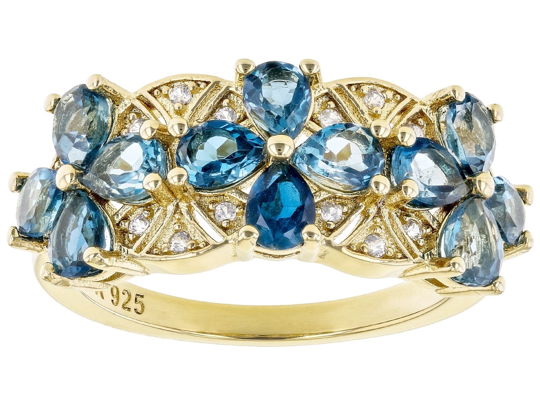 London Blue Topaz 18k Yellow Gold Over Sterling Silver Band Ring 1.80ctw: London Blue Topaz 18k Yellow Gold Over Sterling Silver Band Ring 1.80ctw. 1.73ctw Pear London Blue Topaz And 0.07ctw Round White Zircon 18k Yellow Gold Over Sterling Silver Band Ring. Measures Approxi