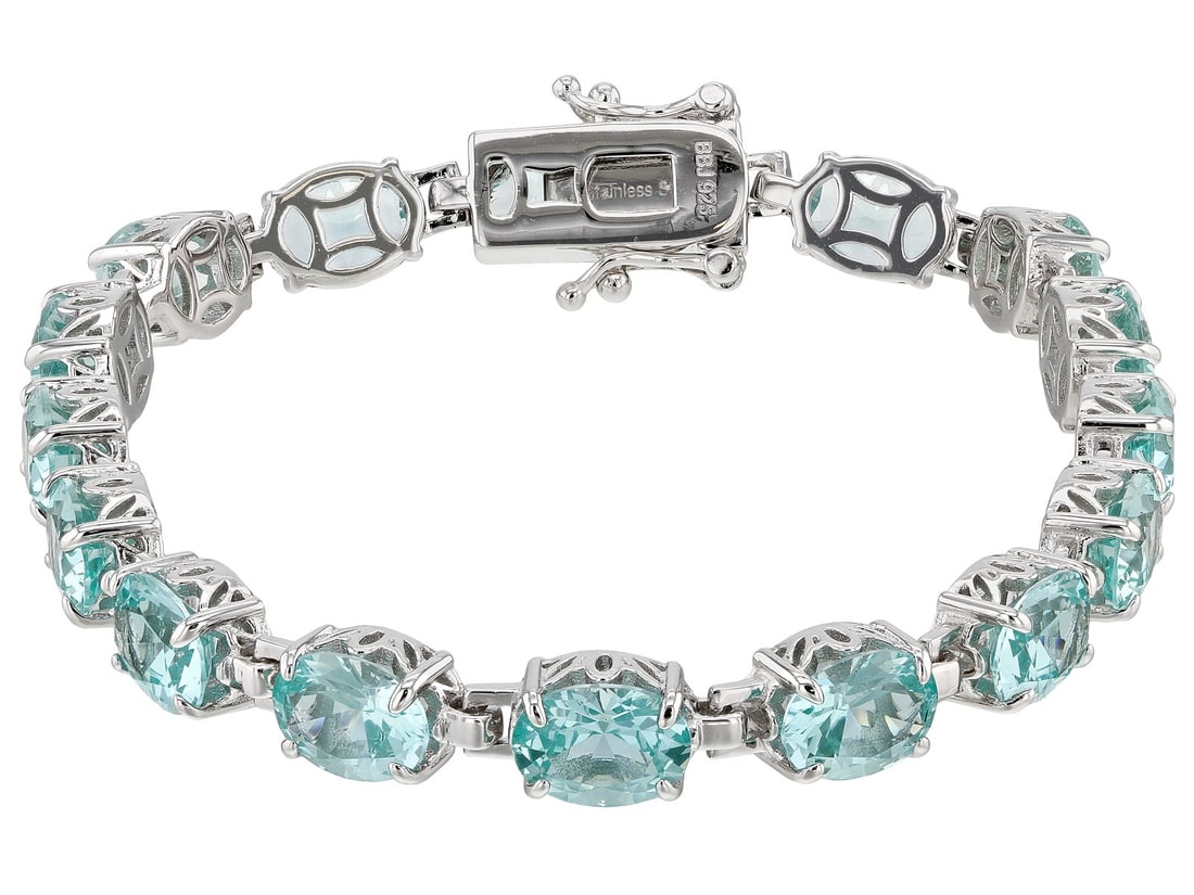 Green Lab Created Spinel Rhodium Over Silver Bracelet 19.80ctw: Green Lab Created Spinel Rhodium Over Silver Bracelet 19.80ctw. 19.80ctw oval lab created green spinel rhodium over sterling silver bracelet. Measures approximately .25"W. Hidden box clasp with double