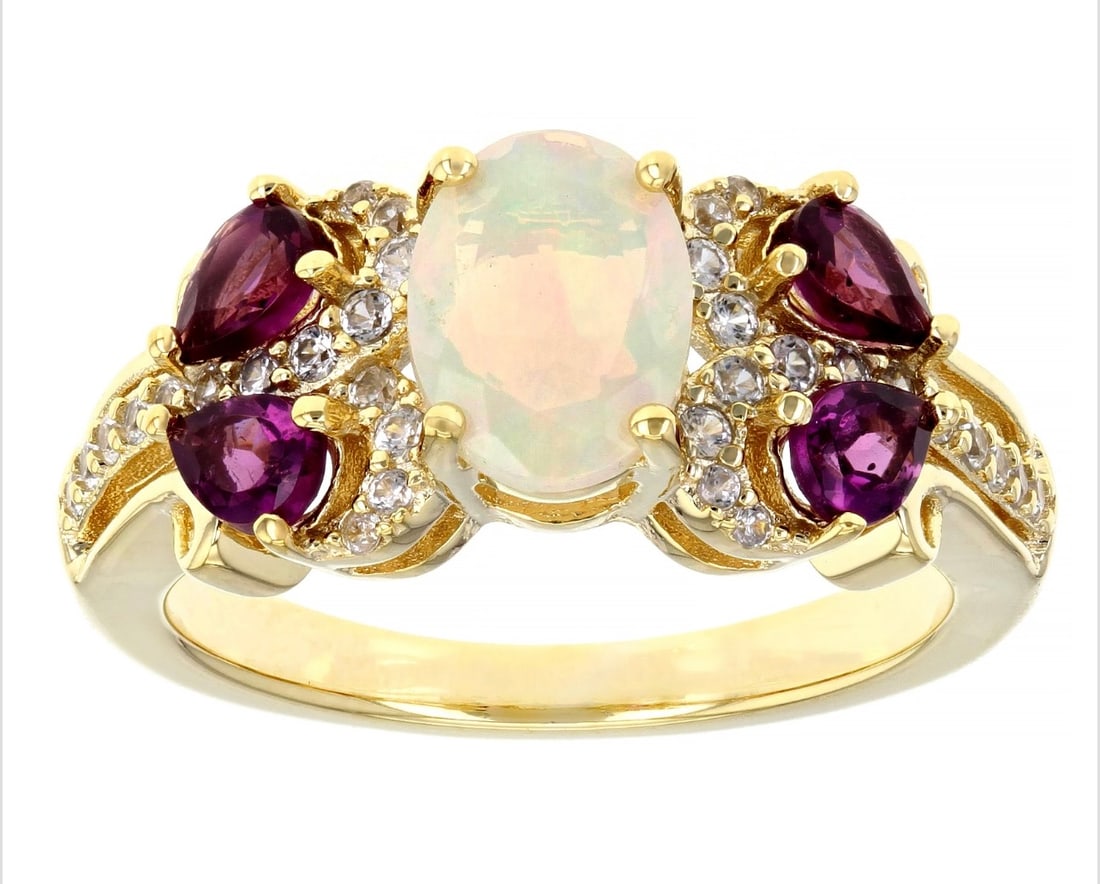 Oval Ethiopian Opal with 0.69ctw Pear-Shaped Raspberry Color Rhodolite: Oval Ethiopian Opal with 0.69ctw Pear-Shaped Raspberry Color Rhodolite and 0.36ctw Round White Zircon 18K Yellow Gold over Sterling Silver Ring. Measures Approximately .86"LX.34"W. SHIPS FROM ORANGE C