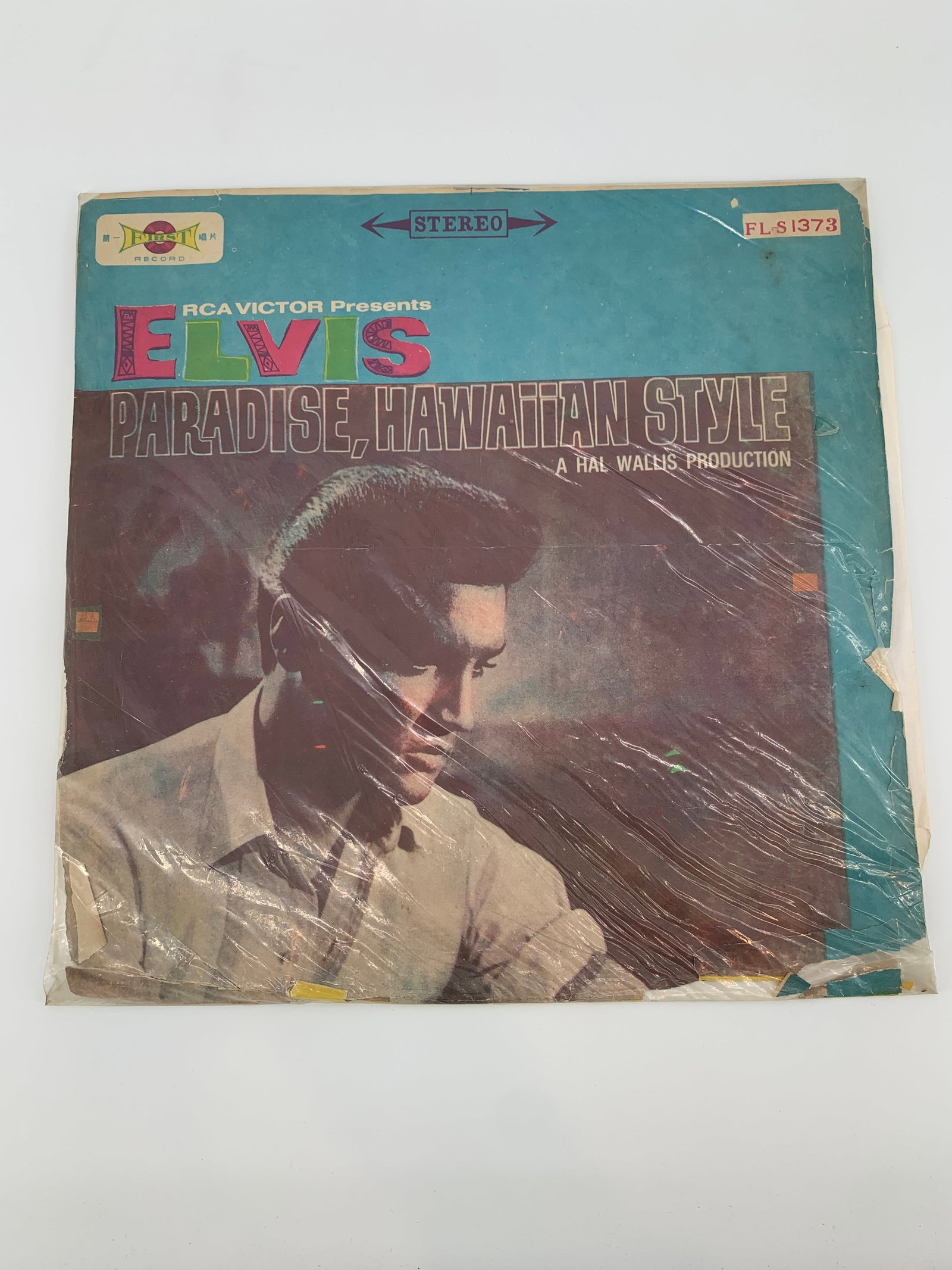 ELVIS PRESLEY - PARADISE, HAWAIIAN STYLE FIRST RECORD – FL-S 1373 VINYL, LP, ALBUM.: PARADISE, HAWAIIAN STYLE. LABEL:FIRST RECORD – FL-1373, FIRST RECORD – FL-S 1373FORMAT:VINYL, LP, ALBUM. The incredible Elvis Presley life story began when Elvis Aaron Presley was born to Vernon a