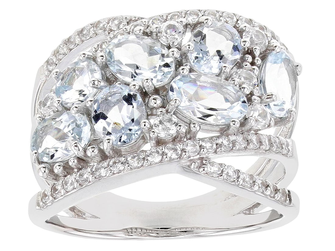 Aquamarine Rhodium Over Sterling Silver Ring 2.35ctw: Aquamarine Rhodium Over Sterling Silver Ring 2.35ctw. 1.50ctw Oval and .20ct Round Aquamarine with .65ctw Round White Zircon Rhodium Over Sterling Silver Ring. Measures Approximately .82"L x .58"W. SH