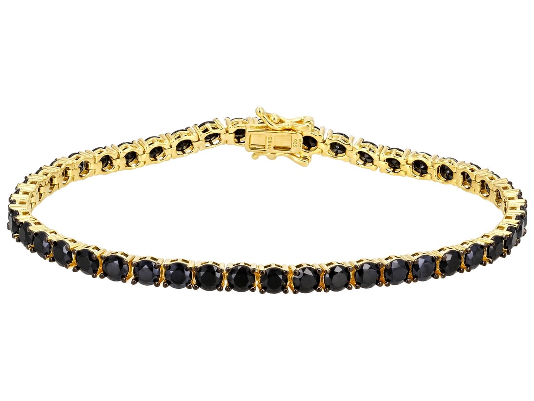 Black Spinel 18k Yellow Gold Over Sterling Silver Bracelet 12.07ctw: Black Spinel 18k Yellow Gold Over Sterling Silver Bracelet 12.07ctw. 12.07ctw Round Black Spinel 18k Yellow Gold Over Sterling Silver Bracelet. Measures Approximately 0.15"W. Hidden Box Clasp. SHIPS F