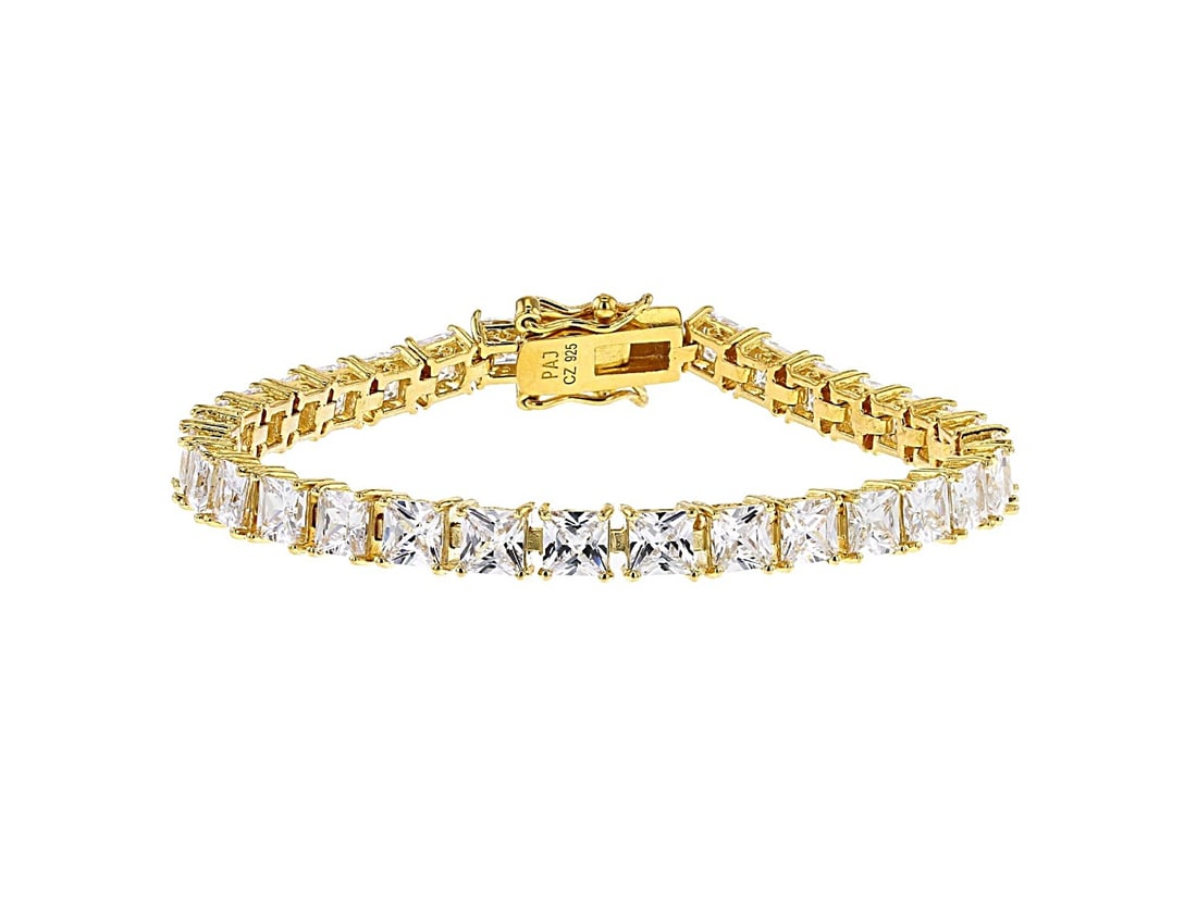 White Cubic Zirconia 18K Yellow Gold Over Sterling Silver Tennis Bracelet 15.09ctw: White Cubic Zirconia 18K Yellow Gold Over Sterling Silver Tennis Bracelet 15.09ctw. White diamond simulant 15.09ctw square, Eterno? 18k yellow gold over sterling silver tennis bracelet. Measures appro