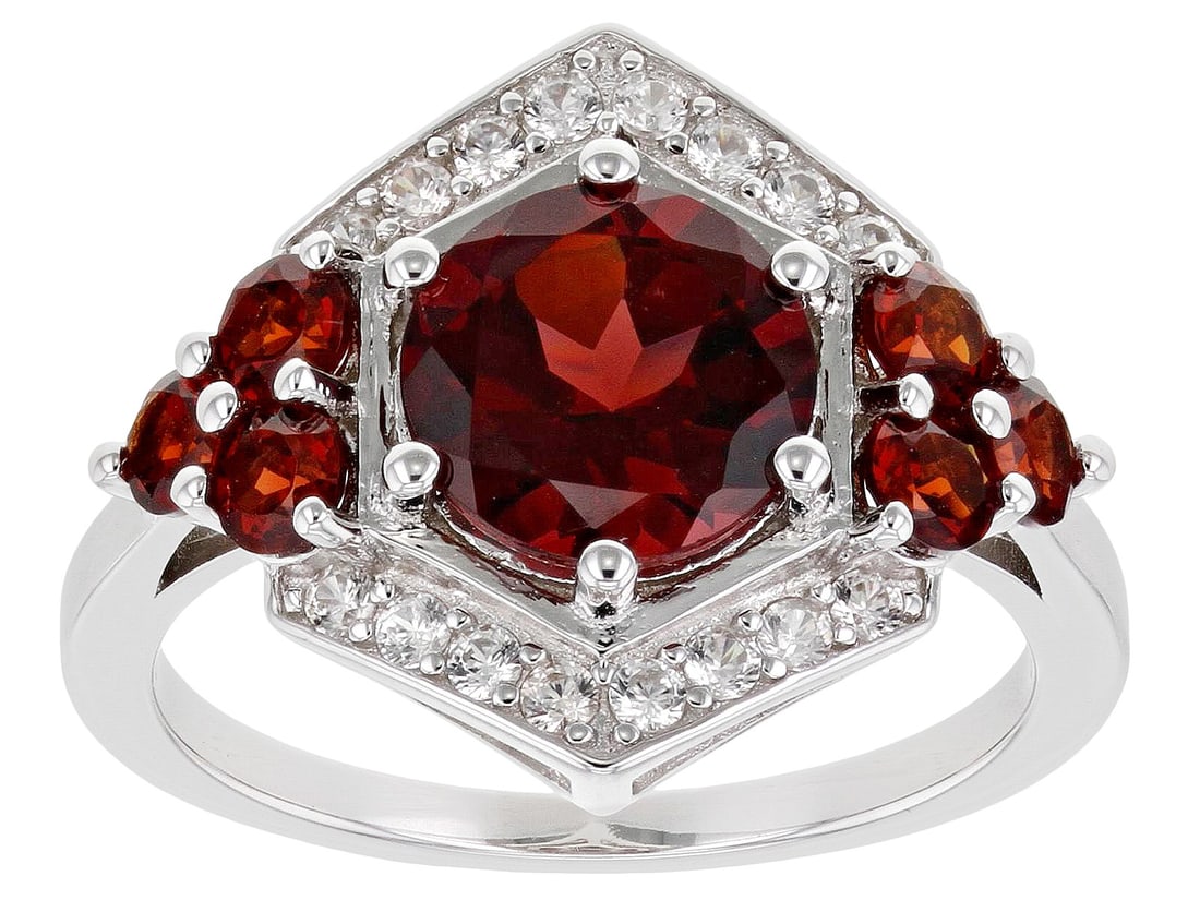 Red Garnet Rhodium Over Sterling Silver Ring 3.28ctw: Red Garnet Rhodium Over Sterling Silver Ring 3.28ctw. 3.01ctw Round Red Vermelho Garnet With 0.27ctw Round White Zircon Rhodium Over Sterling Silver Ring. Measures Approximately 0.72"L X 0.62"W. Not s