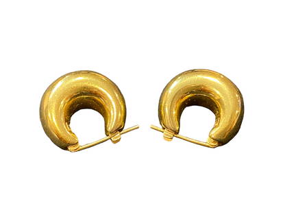 18 Karat Gold Italian Designer Hoop Earrings, Pair: This pair of 18 karat yellow gold earrings from Italy measure approximately 20 mm across and 11 mm at the wide bottom of the hoop. They have a bell style curve design with a brilliant high polished fi