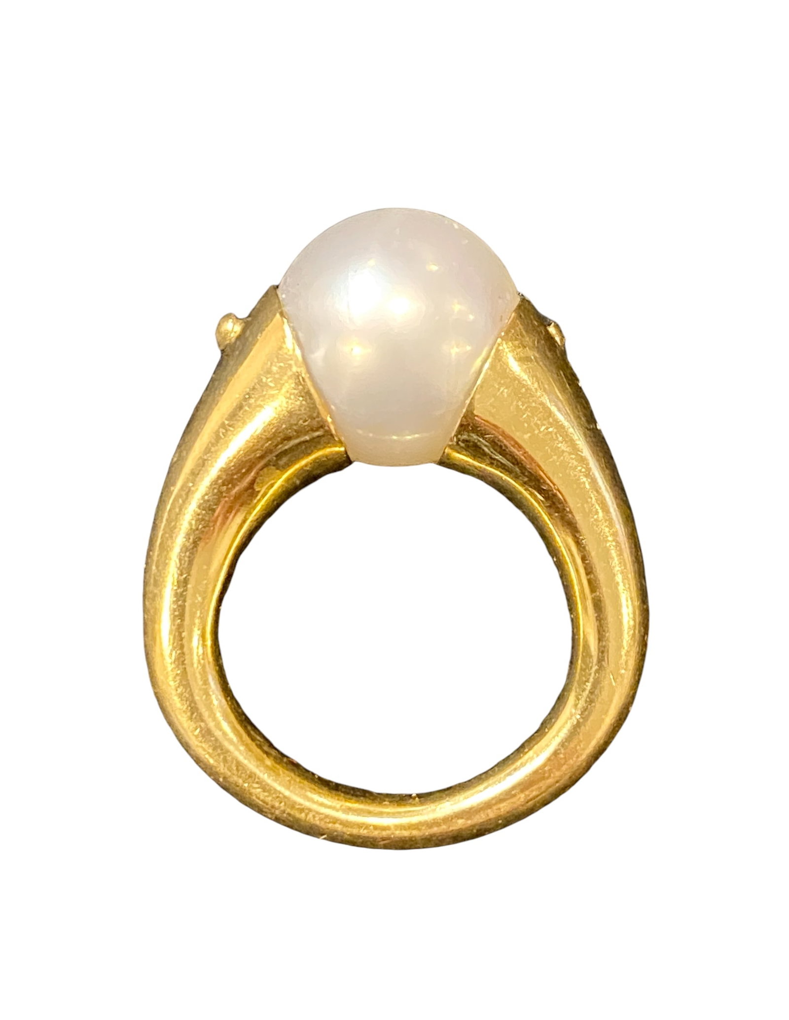 18 Karat Gold Ring with 11.9 mm Cultured Pearl: This 18 karat yellow gold ring features a single 11.9 mm Australian Broom Coast, cultured pearl. This pearl has a silvery natural pearl color with good luster and only slight surface blemishes. It has