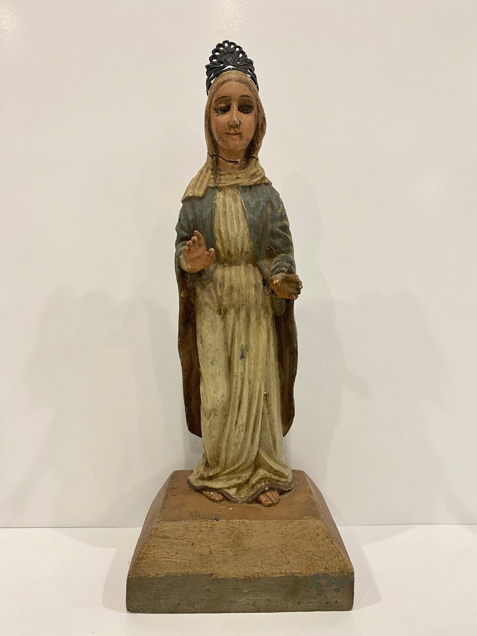 Saint Mary / Virgin Mary Wood Statue: Shipping from Austin, TX. Dimensions: 15 x 6 in Madonna Statue, a sacred portrayal of the Virgin Mary, revered as the Queen of Heaven. The hand-painted details and distressed finish on this Crowned Ma
