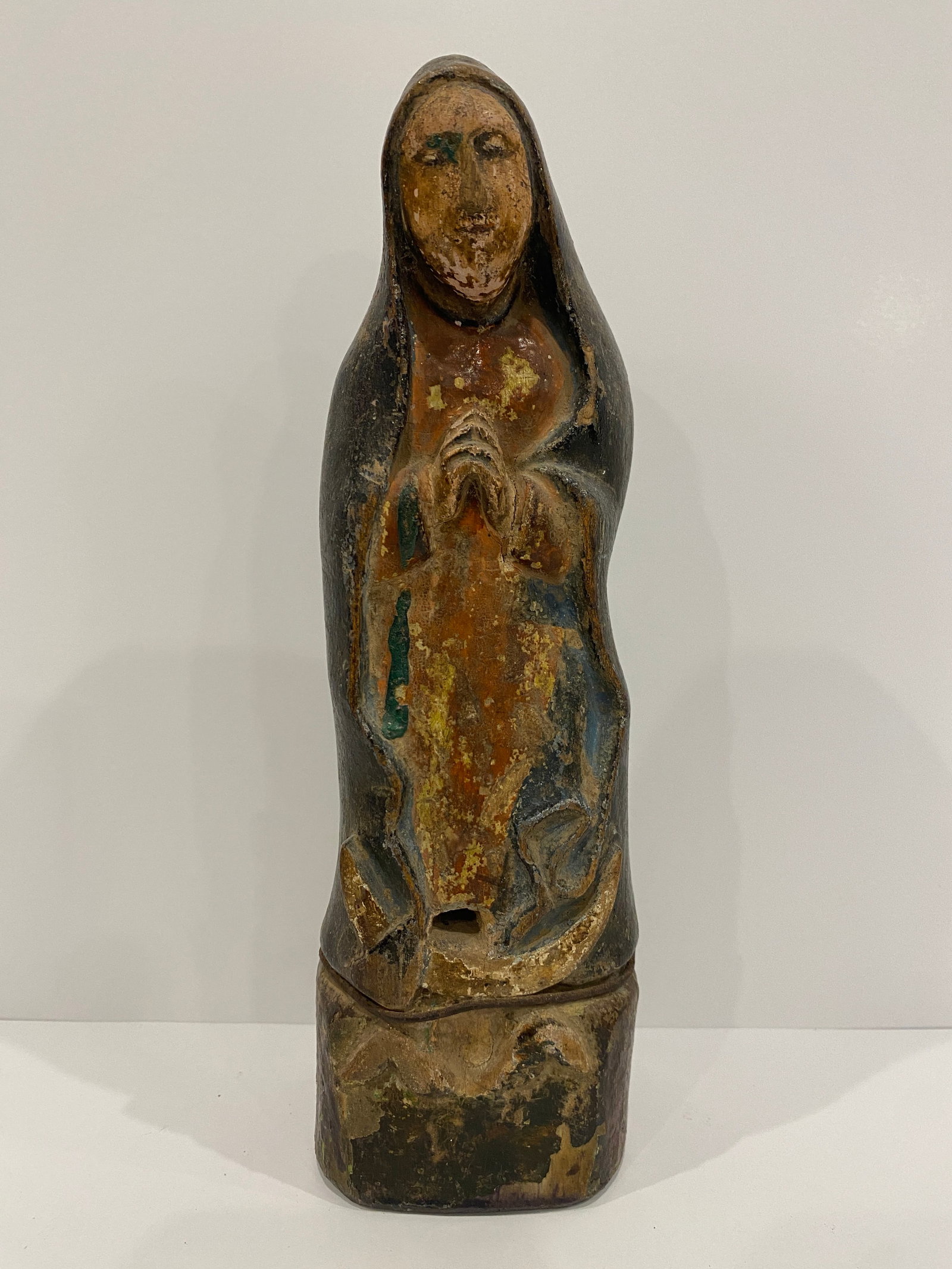 Carved Wood Madonna / Saintess Statue - Blue & Red: Shipping from Austin, TX. Dimensions: 9 x 3 in Carved wood statue of Madonna or saintess praying, weathered paint indicates significant age, this rustic Virgin Mary statue is a lovely representation o