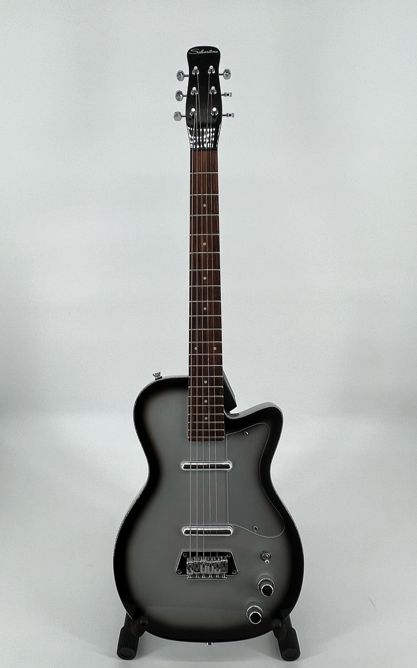 Silvertone 1303/02 1956 Reissue Electric Guitar: Silvertone 1303/02 1956 Reissue Electric Guitar, like new condition, comes with hard case. Shipping from Las Vegas, NV. #131