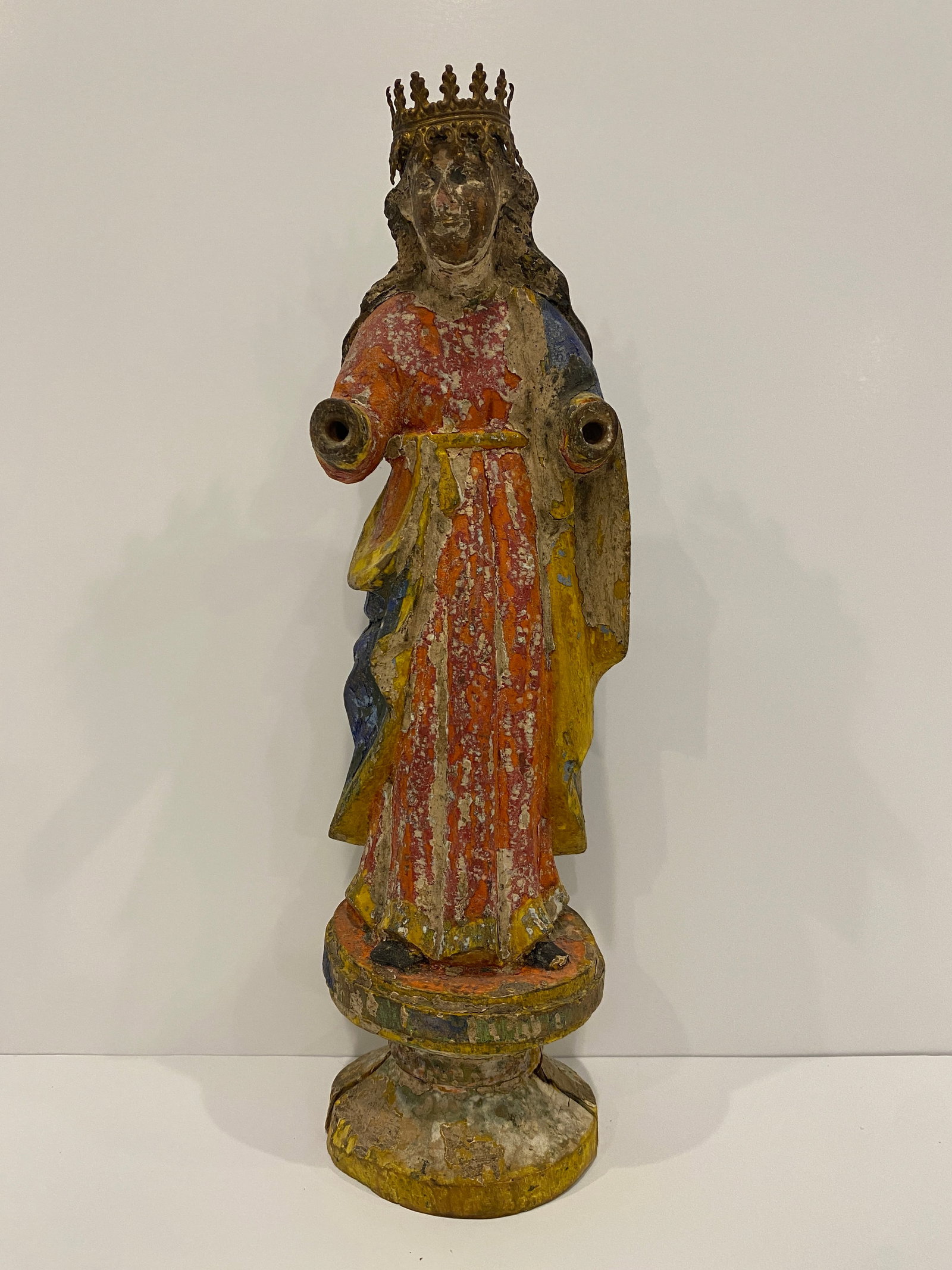 Madonna Statue w/ Crown: Madonna Statue, a sacred portrayal of the Virgin Mary, revered as the Queen of Heaven. The hand-painted details and distressed finish on this Crowned Madonna Sculpture reflect a rich past, making it a