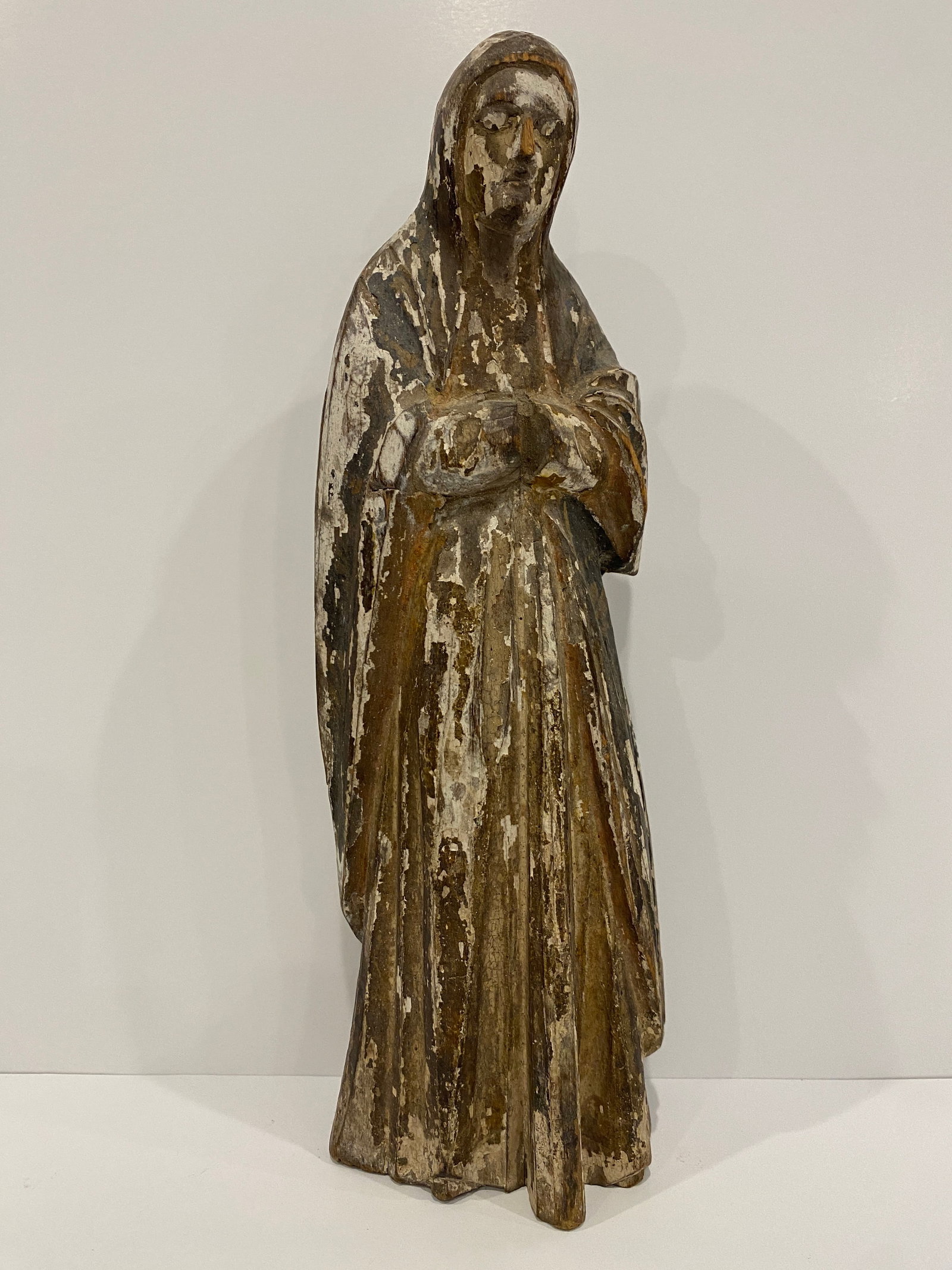 Carved Wood Madonna / Saintess Statue: Carved wood Madonna or saintess statue, weathered paint indicates significant age, this rustic Virgin Mary statue is a lovely representation of religious art. Shipping from Austin, TX. Dimensions: 11 