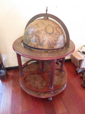 "LOUIS GOSSETT JR COLLECTION"THIS ITALIAN ANTIQUE-: "LOUIS GOSSETT JR COLLECTION"THIS ITALIAN ANTIQUE-STYLE WOODEN GLOBE IS CRAFTED BY ITS ITALIAN MAKERS ACCORDING TO AN AGE-OLD TRADITION: ACCURATE REPRODUCTIONS OF 16TH CENTURY MAPS ARE PRINTED ON PAPE