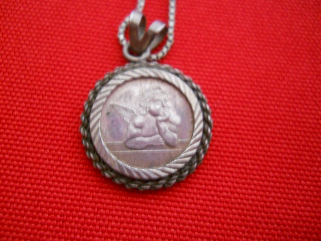 STERLING SILVER ANTIQUED RAPHAEL ANGEL CHARM/CHAIN: RAPHAEL ANGEL, CHERUB CHARM AND CHAIN IN STERLING SILVER CHAIN IS 10 INCHES LONG CHARM IS 1 1/2 INCHES WIDE CHAIN WITH CHARM IS 11 1/2 INCHES LONG
